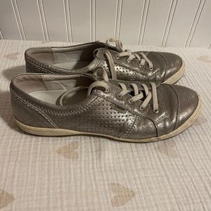 Pewter colored sneakers